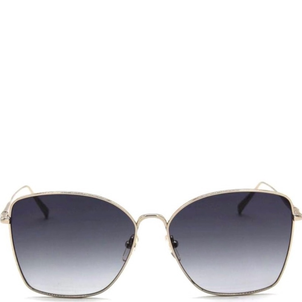 Longchamp LO117S sunglasses metal frame with gradient lenses.